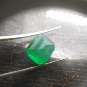 3.87ct deep grass green color, octagon cut emerald