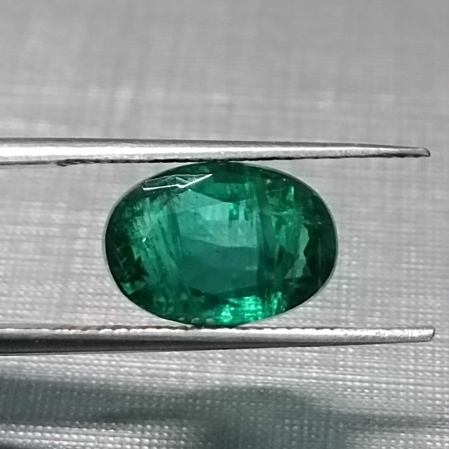 3.02ct GSI certified oval cut deep vivid green Pakistan emerald gem