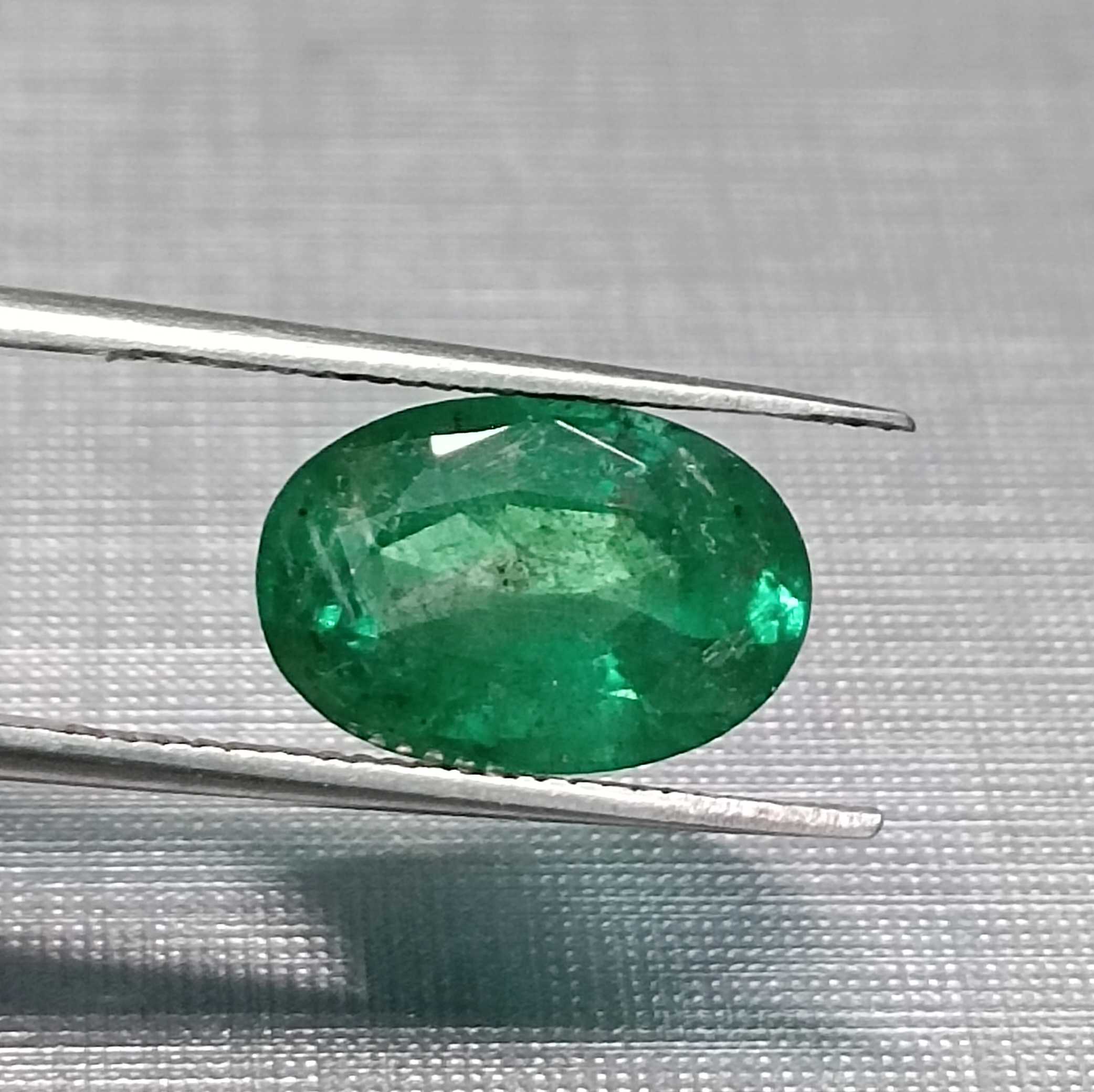 3.24ct GSI certified oval cut medium deep golden green emerald gem