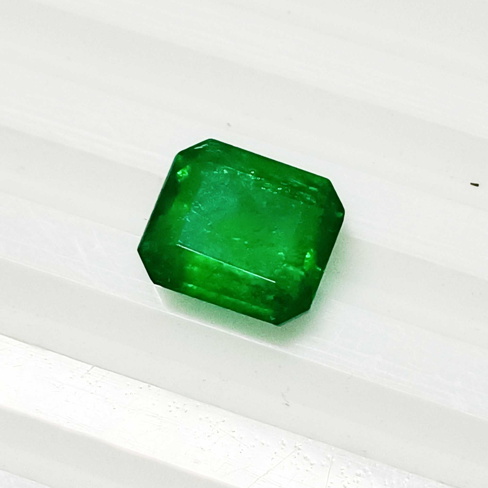 2.35ct octagon step cut neon green color emerald 