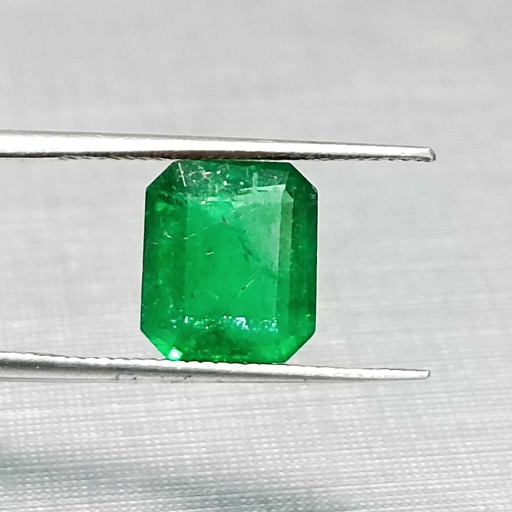 2.35ct octagon step cut neon green color emerald