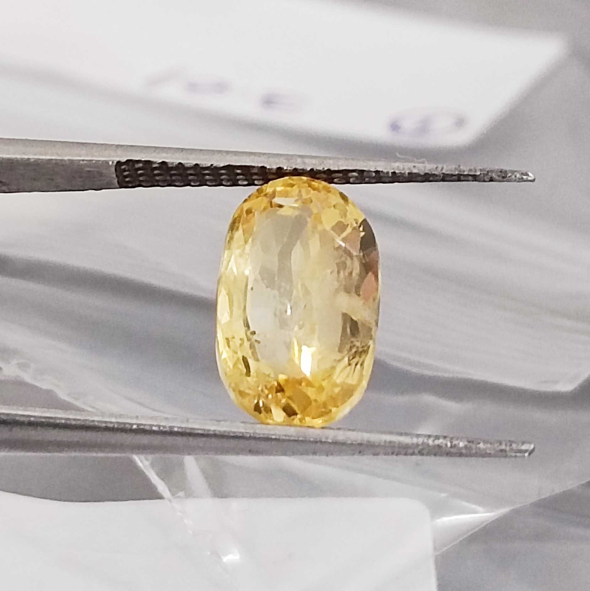 3.01ct certified natural unheated deep vivid yellow oval cut Ceylon sapphire gemstone