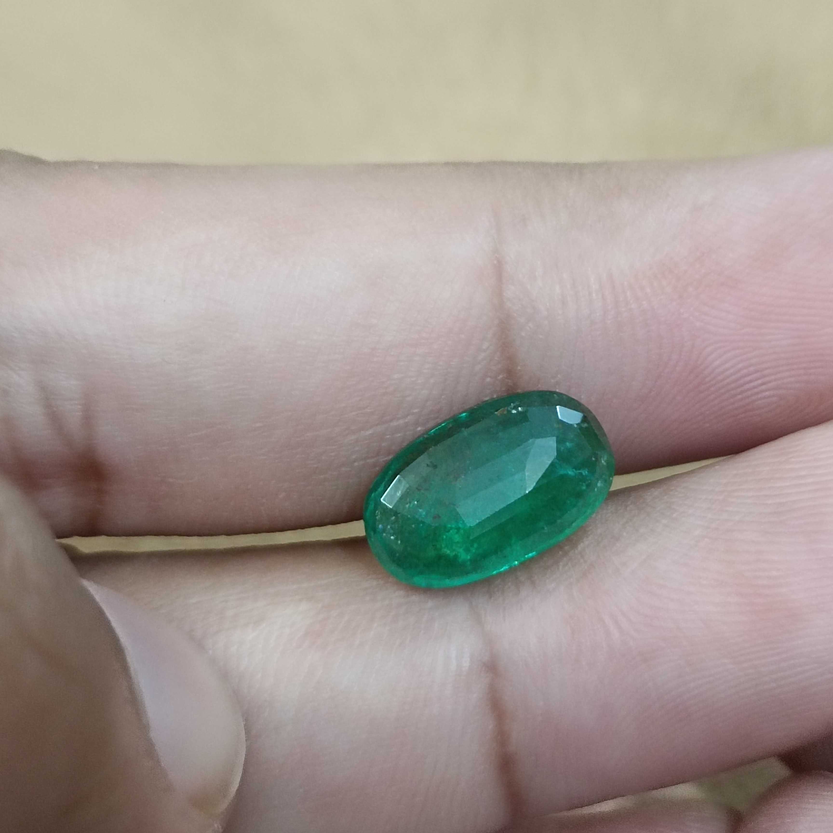 4.36ct GSI certified deep green elongated oval cut Zambian emerald gem 