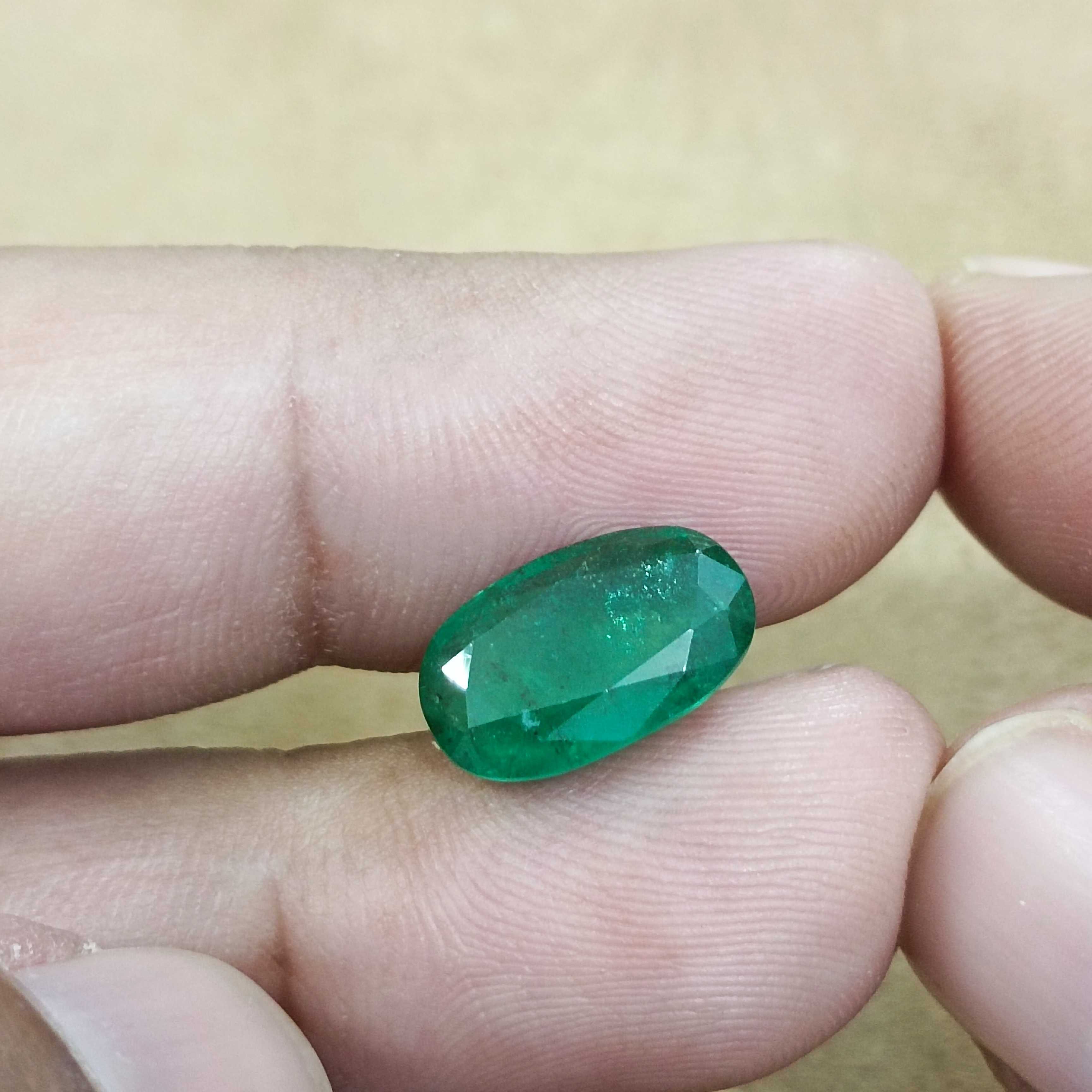 4.36ct GSI certified deep green elongated oval cut Zambian emerald gem 