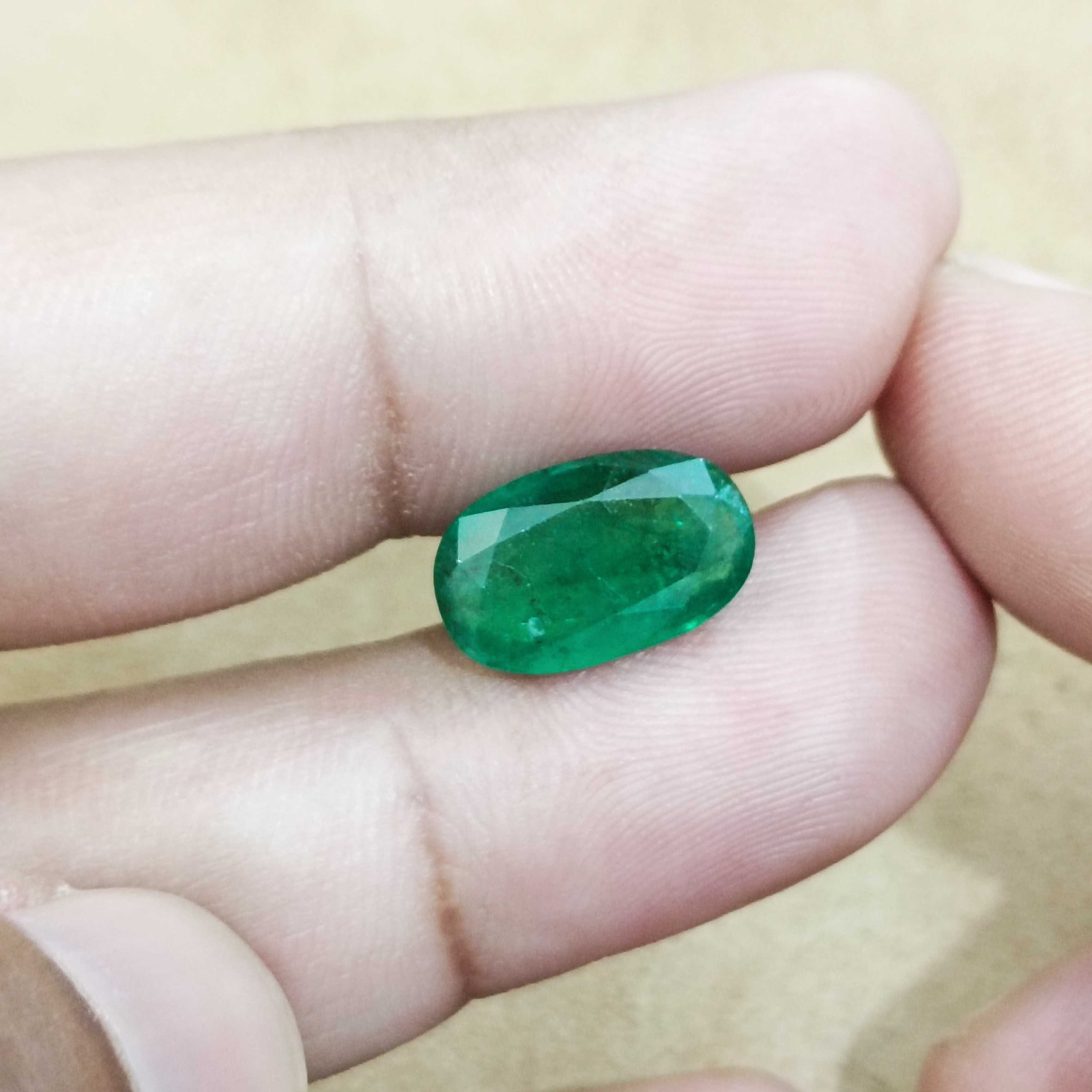 4.36ct GSI certified deep green elongated oval cut Zambian emerald gem 